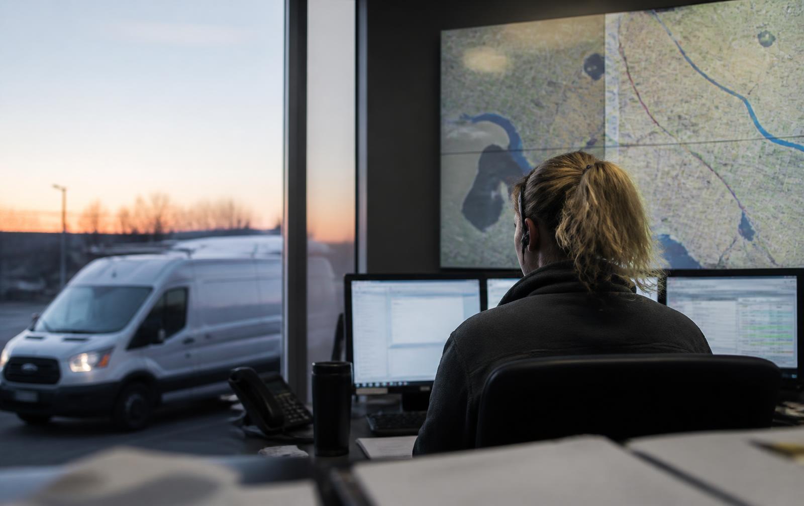 Field technician reviewing a work order on a rugged tablet
